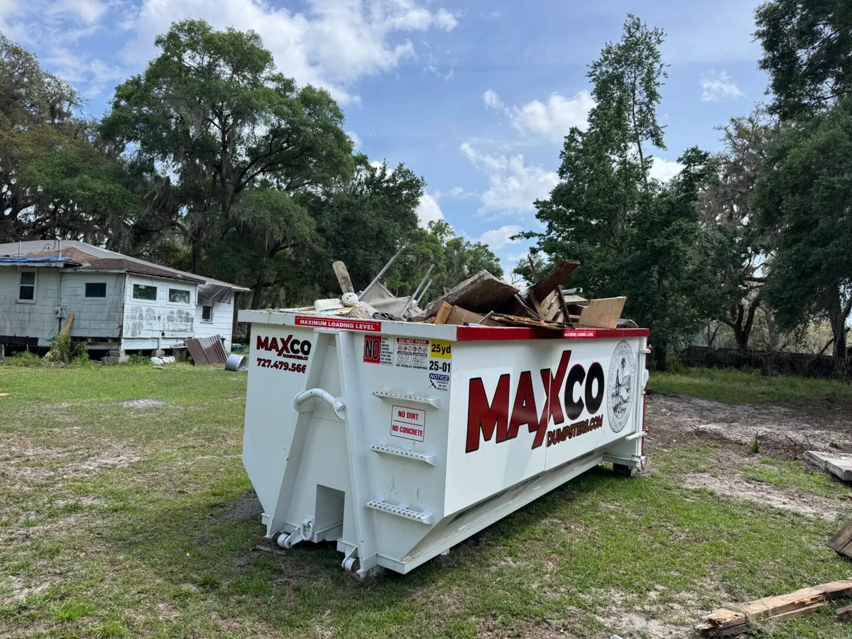 MAXCO dumpster for TPO commercial roofing material